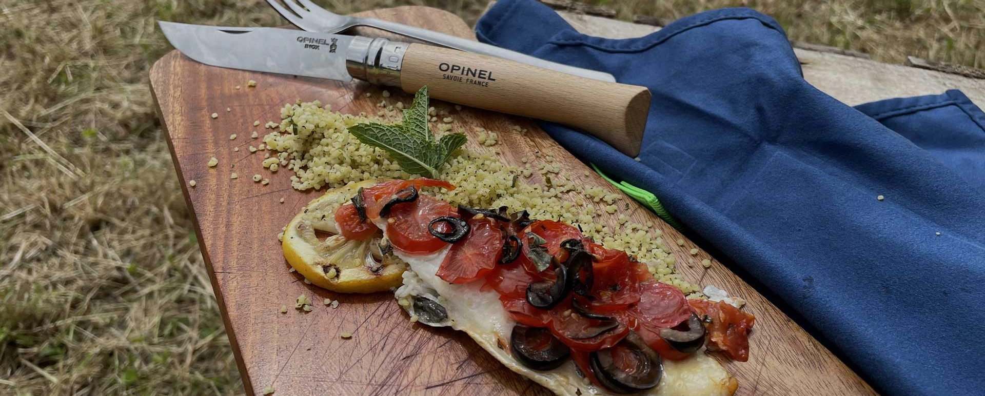 Sea bream with tomatoes and olives on the barbecue by Alexandre Hurson